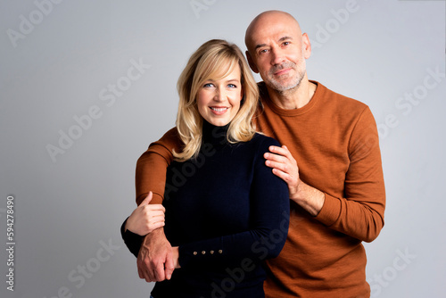 Smiling couple against white background