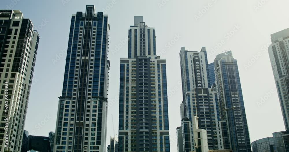 custom made wallpaper toronto digitalModern glass minimalistic skyscrapers in the city center, view from below in motion