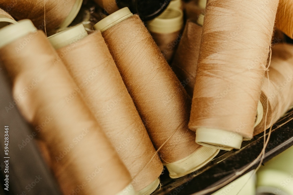Closeup shot of colored spools of thread