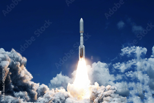 The launch of a space rocket into space. Elements of this image furnished NASA.