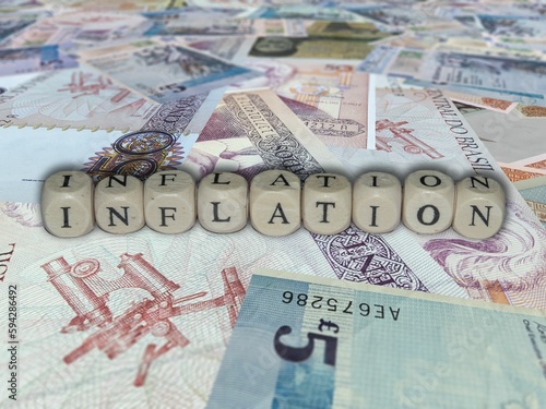 Foto Pile of various currencies in a jumbled stack with words displayed at the top