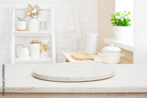 Pedestal for product display on wooden desk and kitchen interior