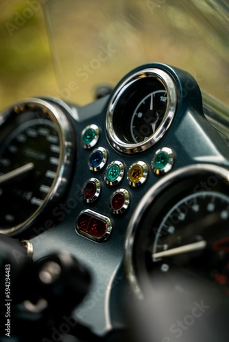 Vertical shot of a control panel of a motorbike