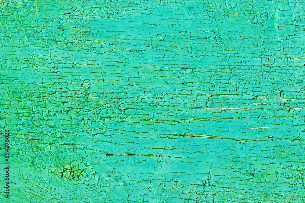 Abstract background of cracked weathered old wood with layers of paint Abstract background of cracked weathered old wood with layers of paint