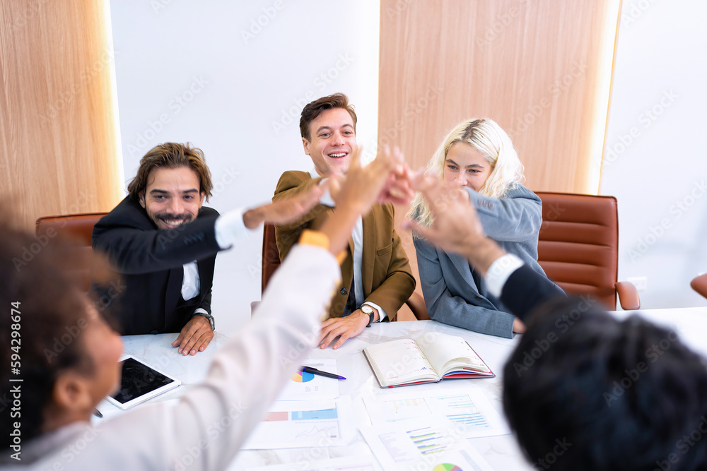 Fototapeta premium Employee on job corporate Business colleagues sit around table work as team and hand gathering