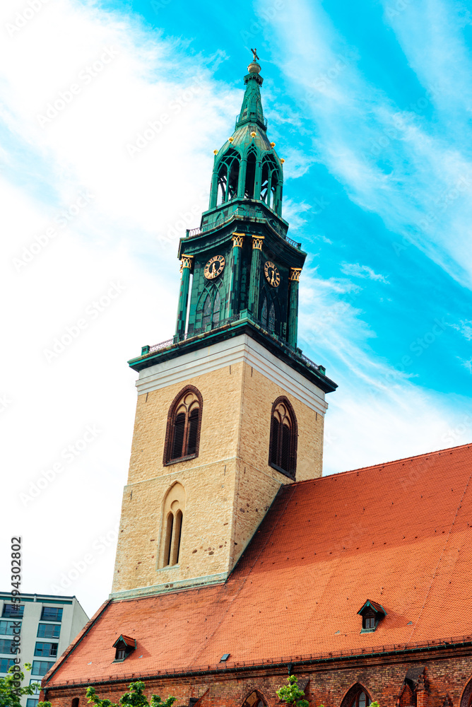 BERLIN, GERMANY - MAY 27, 2017: St Mary's Church tower on blue sky background