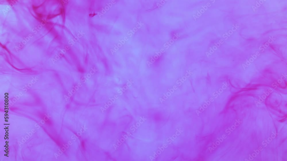 Lilac ink in a background slow motion Lilac ink in a background slow motion