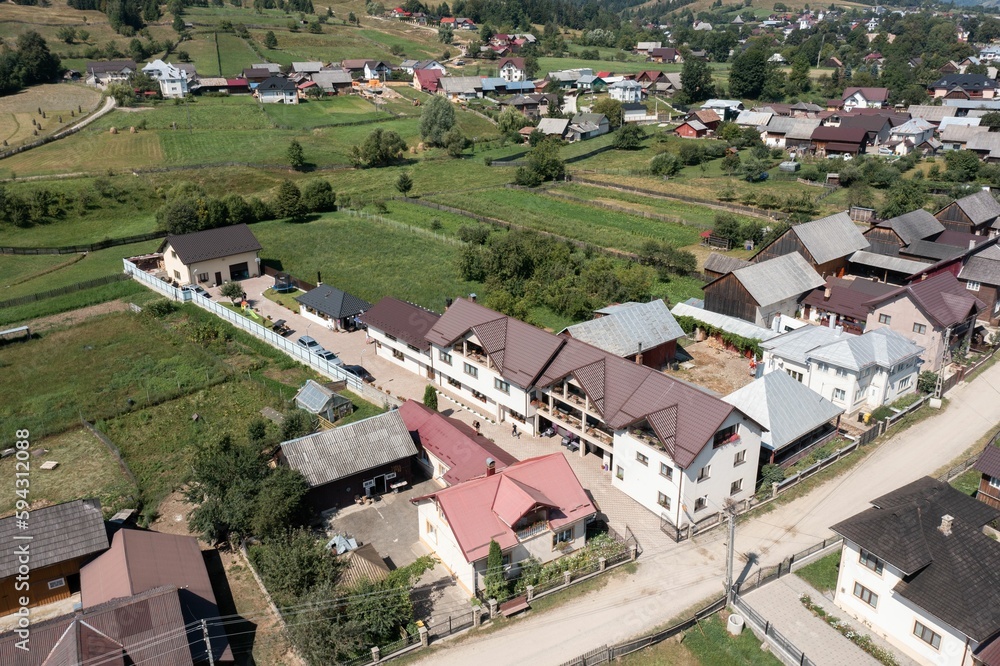 Aerial landscape over a village with lands