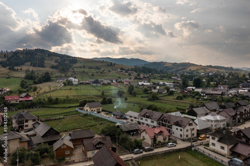 Aerial landscape over a village with lands