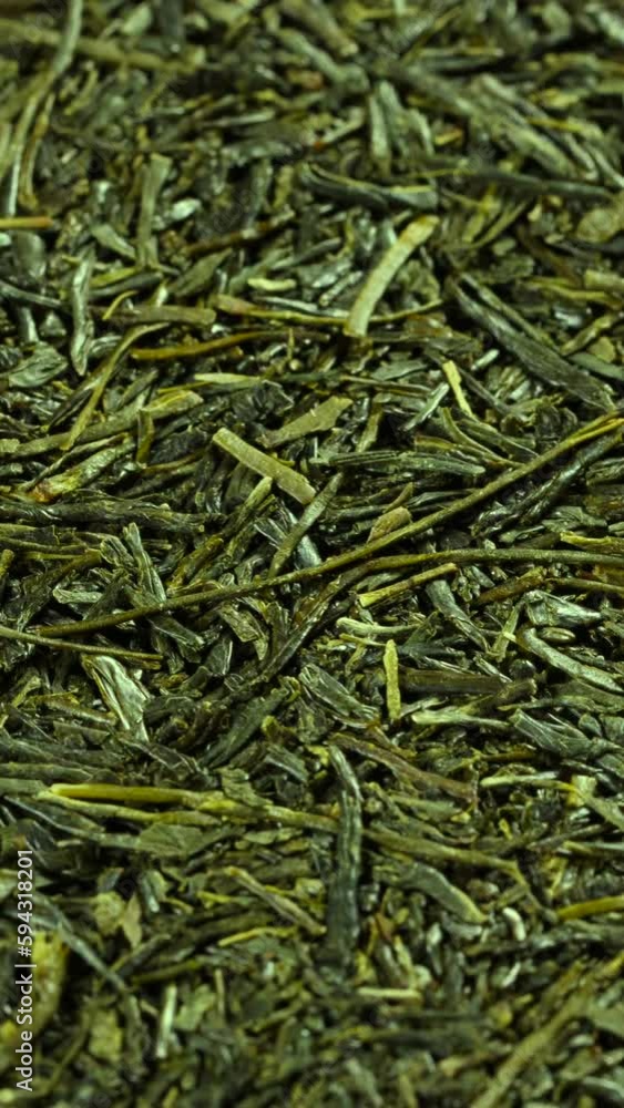 smooth vertical traveling dolly shot closeup on japanese green tea leaves smooth vertical traveling dolly shot closeup on japanese green tea leaves