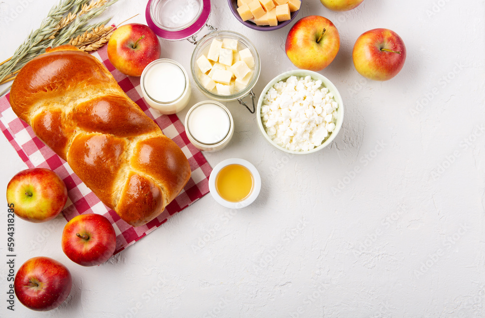 Jewish Shavuot Holiday Card. Dairy Products, Apples, Cheese, Bread, Milk on White Background.