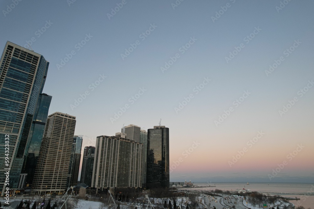 View of Chicago at night, showcasing the illuminated skyline of the city's towering skyscrapers