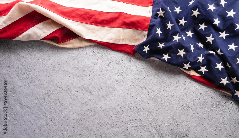 Obraz premium Happy Memorial day concept made from American flag on dark stone background.