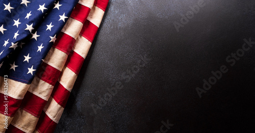 Happy Memorial day concept made from American flag  on dark stone background.