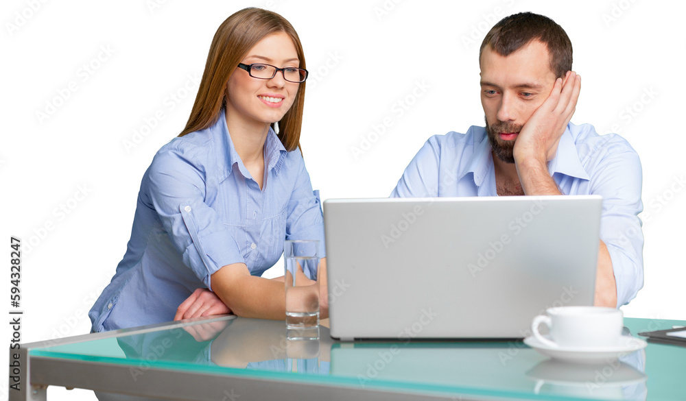 Business couple working on laptop sitting at desk Business couple working on laptop sitting at desk