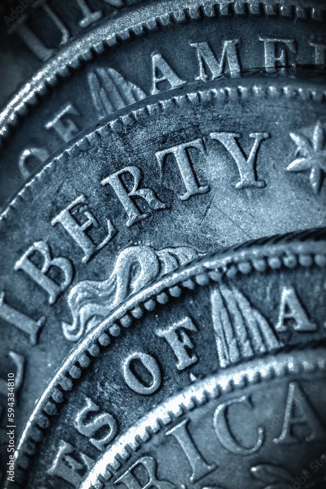 Old US coins with inscription: Liberty as symbol: America is the land of opportunities and freedom. Vertical image. Old US coins with inscription: Liberty as symbol: America is the land of opportunities and freedom. Vertical image.