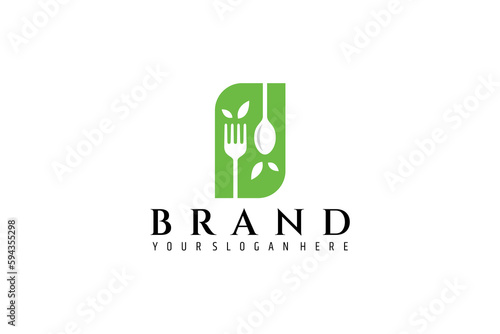 Spoon and fork logo with green leaf decoration suitable for diner, restaurant, cafe and food products