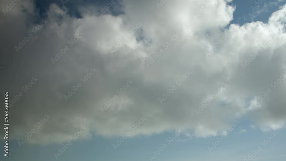 Heavy cumulus clouds in the sky, accelerated video, timelapse. The sky is like a background. Heavy cumulus clouds in the sky, accelerated video, timelapse. The sky is like a background.