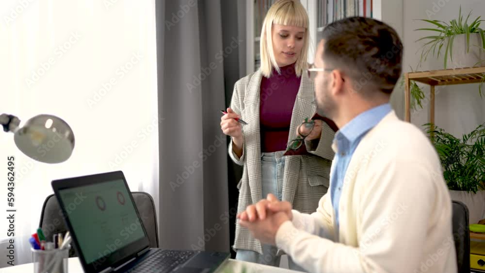 Couple who are managing to balance work and home life efficiently ...