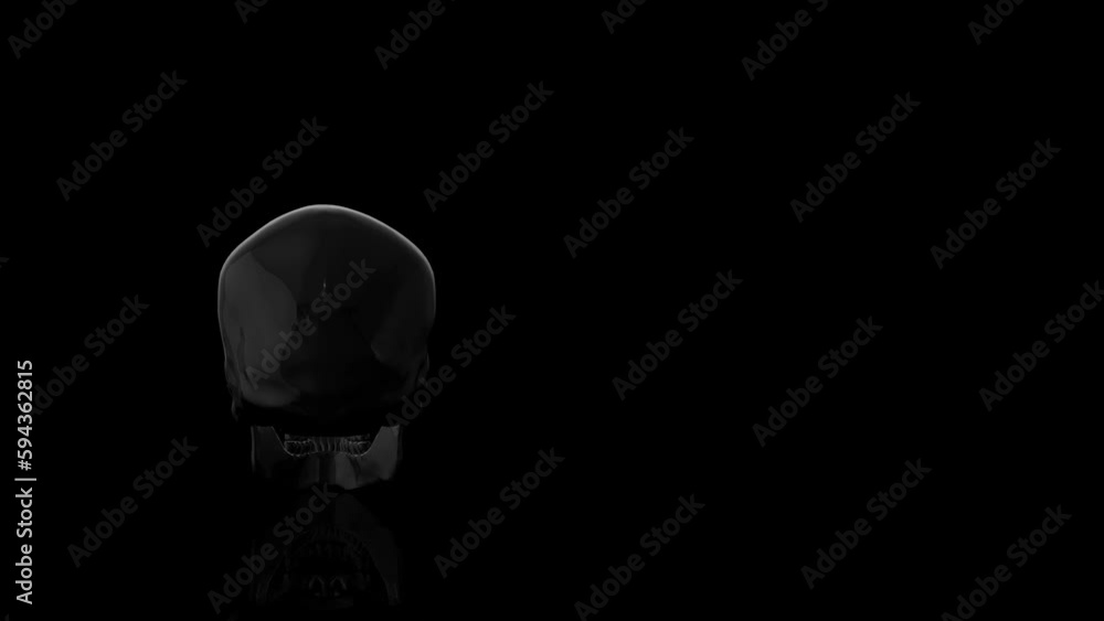 Black glass Skull turns on itself animation Black glass Skull turns on itself animation