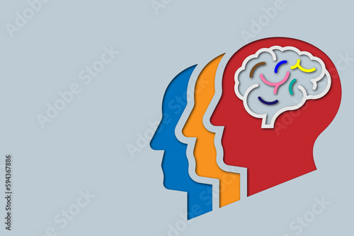 Realistic paper cut human head brain. Colorful papercut man silhouette on graybackground