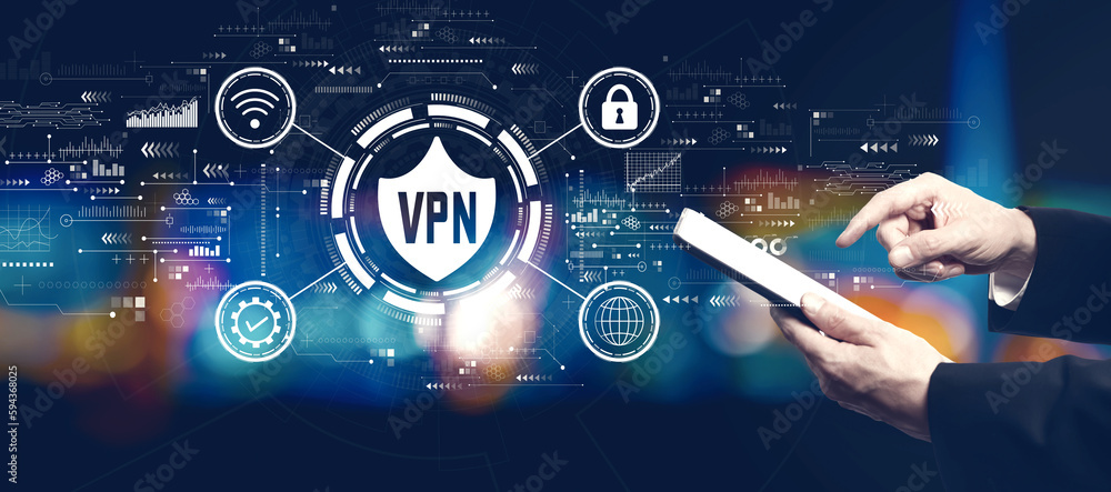 VPN concept with businessman using a tablet computer at night VPN concept with businessman using a tablet computer at night