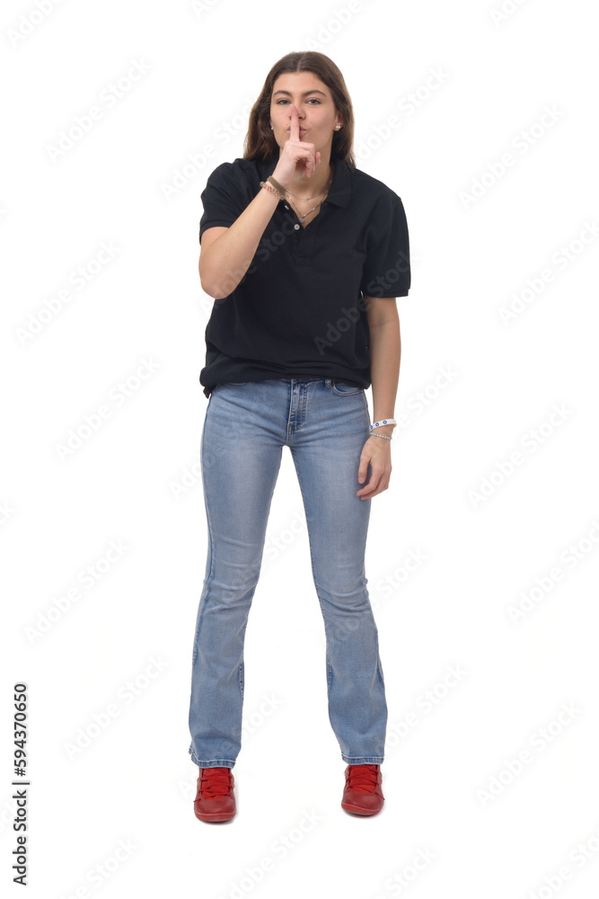 girl showing silence sign with fingers on white background girl showing silence sign with fingers on white background