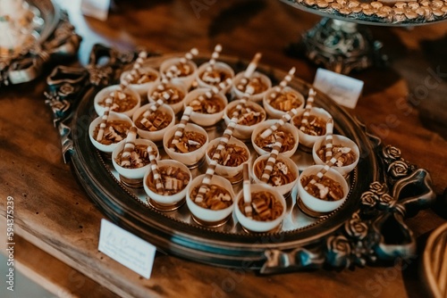 Closeup of a festive table with a pile of sweets during the ceremony