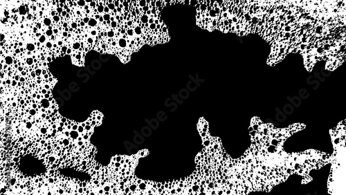 Background with black and white soap grunge stains. Sponge spots. Foam water. Liquid on glass. Foam texture with copy space. Template with foam splash. Soap bubbles. Cleaning. Washing the surface