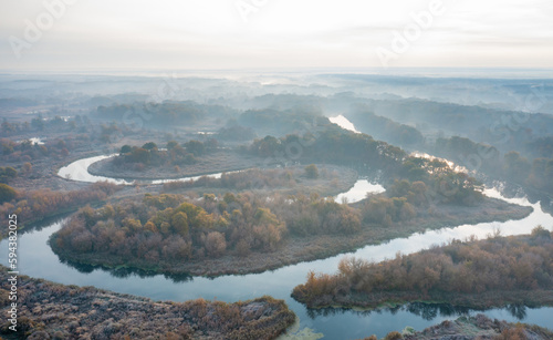 Sunrise over a foggy river on a frosty autumn morning aerial photography