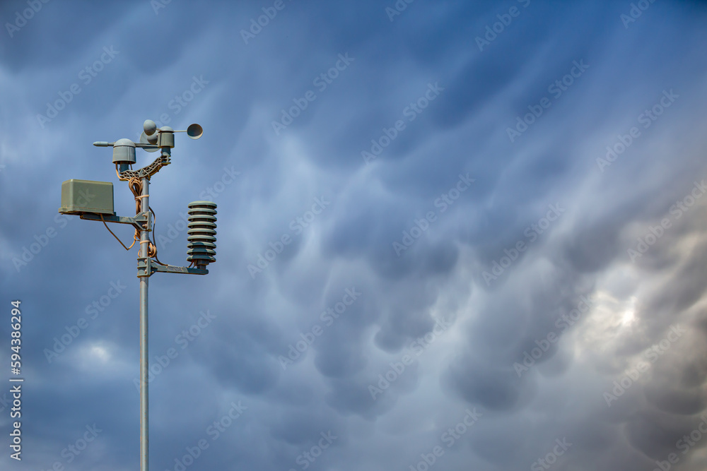 Weather station automatic measurement of weather parameters with Large Mammatus clouds in the sky after a storm Weather station automatic measurement of weather parameters with Large Mammatus clouds in the sky after a storm