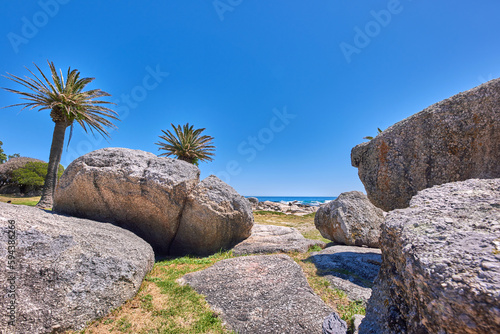 Rocky coastline of the Camps Bay, Western Cape. Ocean view - Camps Bay, Table Mountain National Park, Cape Town, South Africa.