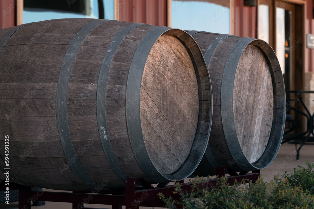 Views from inside a craft wine brewery with aging casks and barrels