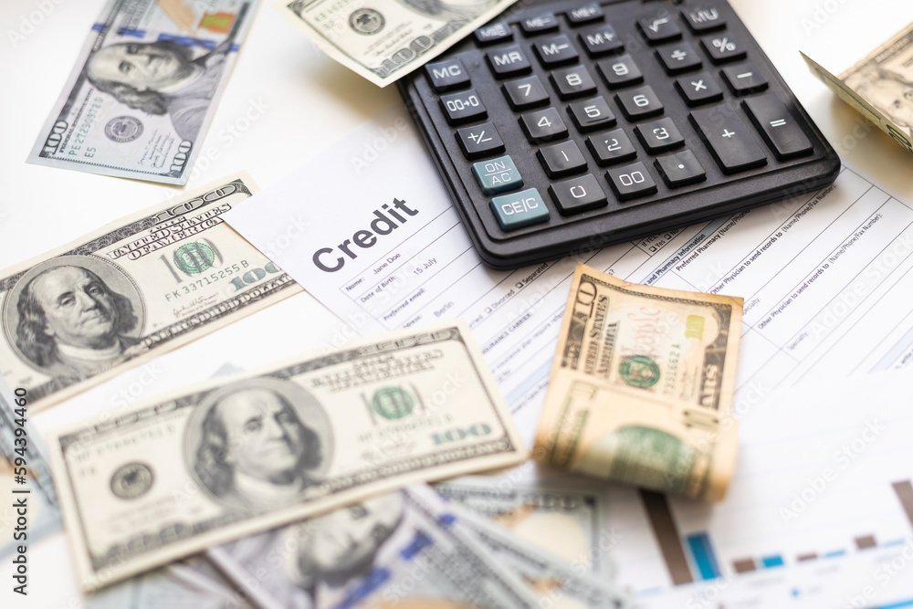 business graph chart paper pen calculator us dollar on office desk. Checking financial reports. business graph chart paper pen calculator us dollar on office desk. Checking financial reports.