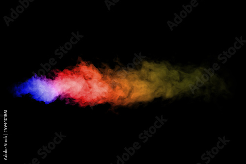 Art photo of smoke moves on black background. Beautiful swirling colorful smoke.