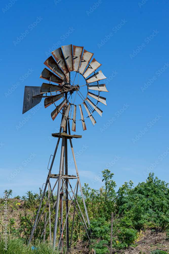 old windmill in the argentinian countryside old windmill in the argentinian countryside