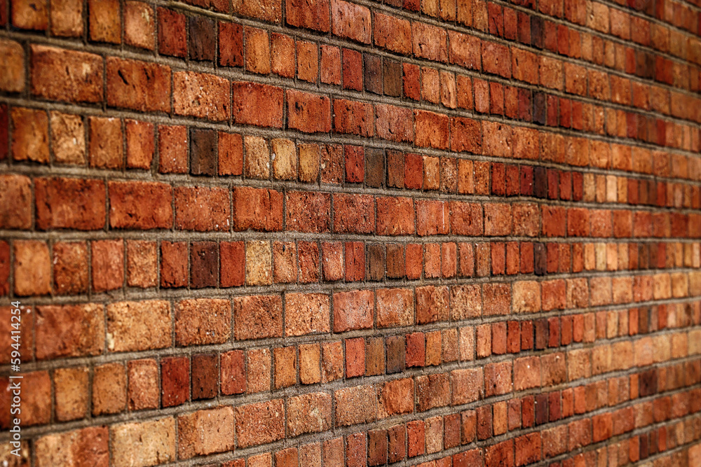 Obraz premium Mur z czerwonej cegły z równych prostokątów. Ściana.