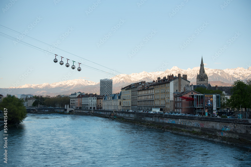 view of the river and the bridge in Grenoble France view of the river and the bridge in Grenoble France