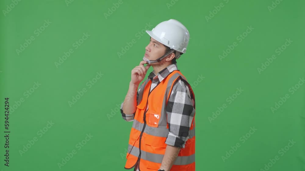 Side View Of Asian Male Engineer With Safety Helmet Thinking And Looking Around Then Raising His Index Finger While Standing In The Green Screen Background Studio
Side View Of Asian Male Engineer With Safety Helmet Thinking And Looking Around Then Raising His Index Finger While Standing In The Green Screen Background Studio
