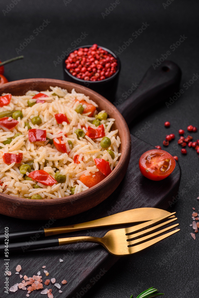 Delicious boiled rice with vegetables peppers, carrots, peas and asparagus beans Delicious boiled rice with vegetables peppers, carrots, peas and asparagus beans