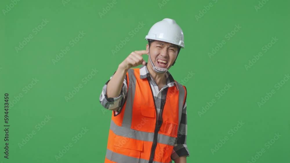Angry Asian Male Engineer With Safety Helmet Shouting At Someone While Standing In The Green Screen Background Studio
Angry Asian Male Engineer With Safety Helmet Shouting At Someone While Standing In The Green Screen Background Studio
