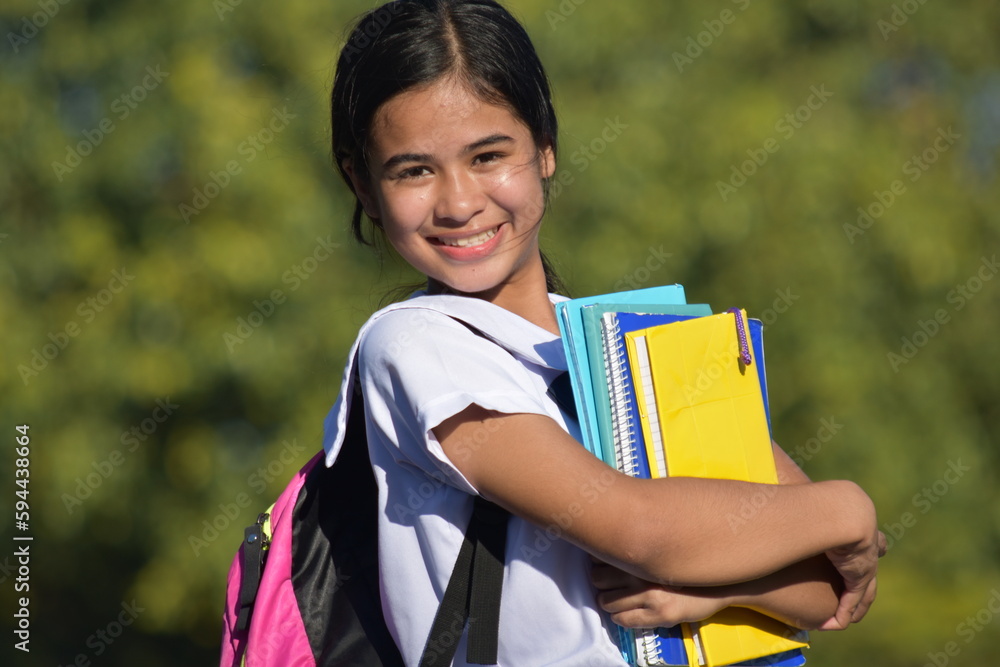 Young Filipina Girl Student Smiling Wearing School Uniform Holding Books Young Filipina Girl Student Smiling Wearing School Uniform Holding Books