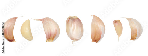 Peeled and unpeeled garlic on a white isolated background photo
