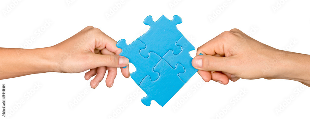Closeup on Hands Combining Puzzle Pieces Together Closeup on Hands Combining Puzzle Pieces Together