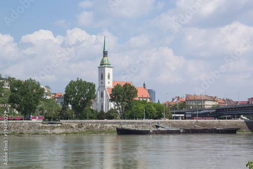 Beautiful view of St. Martin's Cathedral on the banks of the Danube in the old town of Bratislava, Slovakia on a sunny summer day 