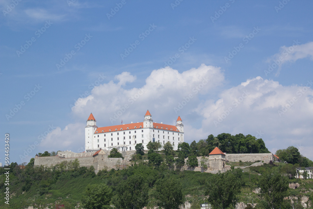 Beautiful view of the Bratislava castle on the banks of the Danube in the old town of Bratislava, Slovakia on a sunny summer day