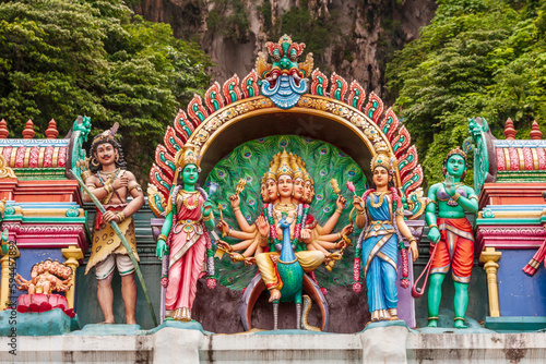 Kuala Lumpur, West Malaysia. Batu caves. Painted Hindu deities on altars.
