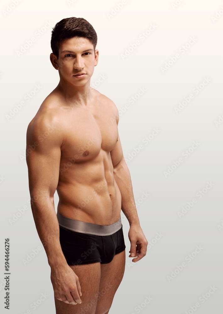 Fototapeta premium Fitness sporty young male model posing