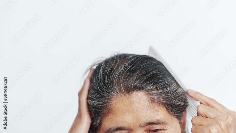 Close up older elderly asian chinese woman gray hair worry cancer worry about hair loss Close up older elderly asian chinese woman gray hair worry cancer worry about hair loss