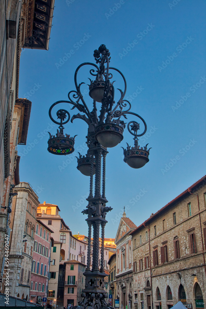 Italy, Umbria. Wrought iron lamppost in the town of Perugia.